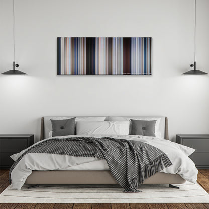 Jaws color palette canvas above a bed, between two black pendant lamps
