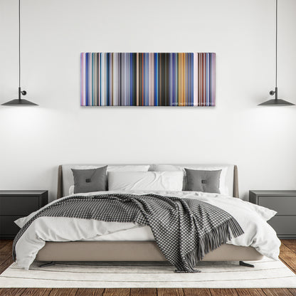The Cell color palette canvas above a bed, between two black pendant lamps