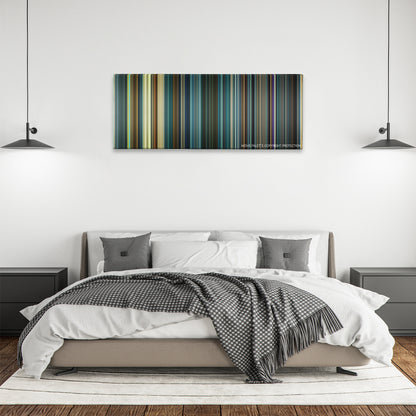 Geostorm color palette canvas above a bed, between two black pendant lamps