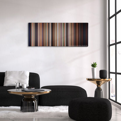 Edward Scissorhands color palette canvas above a black sofa with a gold-topped table