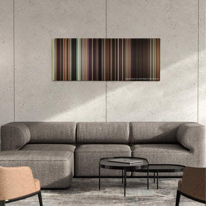 Ruby Sparks color palette canvas on a concrete wall above a gray sectional sofa
