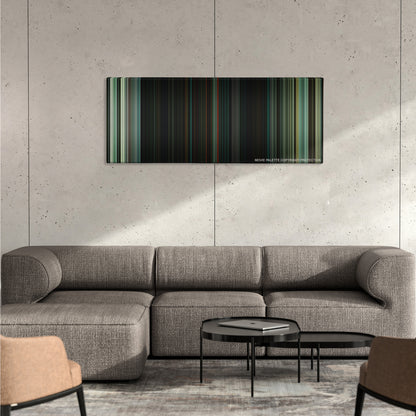 Don't Breathe color palette canvas on a concrete wall above a gray sectional sofa