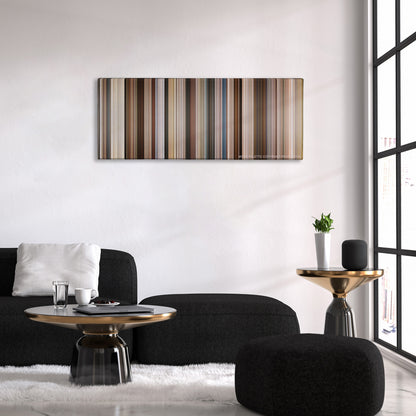 Ford v Ferrari color palette canvas above a black sofa with a gold-topped table