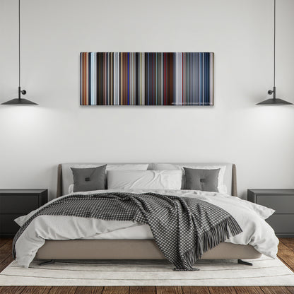 Tomorrowland color palette canvas above a bed, between two black pendant lamps