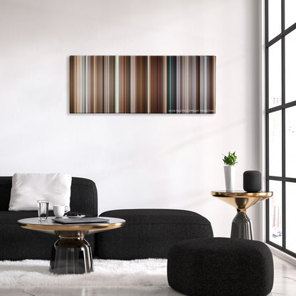 Long Shot color palette canvas above a black sofa with a gold-topped table