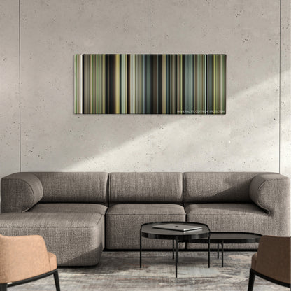 The Devil All the Time color palette canvas on a concrete wall above a gray sectional sofa