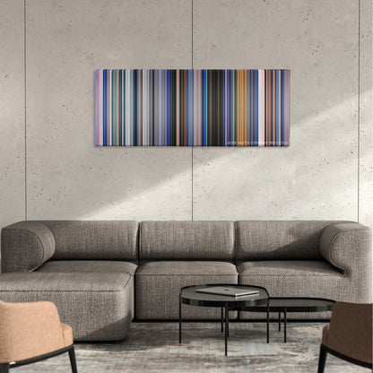 The Cell color palette canvas on a concrete wall above a gray sectional sofa