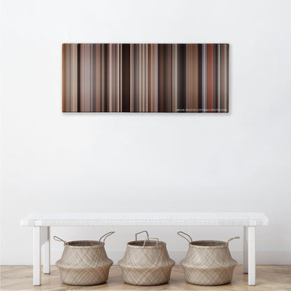 The Devil Wears Prada color palette canvas above a white bench with three woven baskets