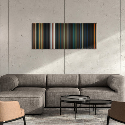Ghost Rider color palette canvas on a concrete wall above a gray sectional sofa