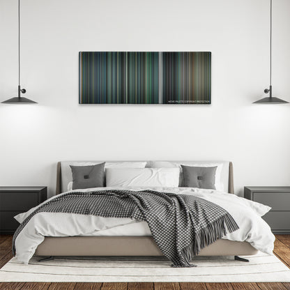 Money Monster color palette canvas above a bed, between two black pendant lamps