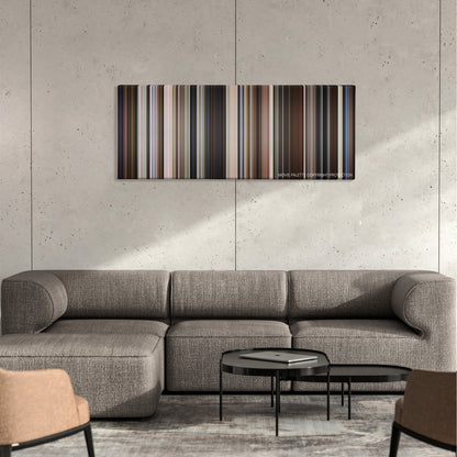 Inherent Vice color palette canvas on a concrete wall above a gray sectional sofa