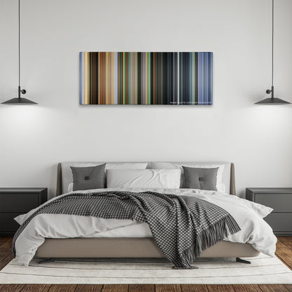 City of God color palette canvas above a bed, between two black pendant lamps