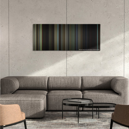 A History of Violence color palette canvas on a concrete wall above a gray sectional sofa