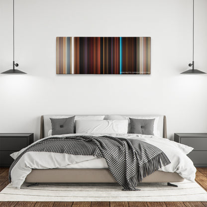 Booksmart color palette canvas above a bed, between two black pendant lamps