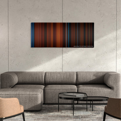 The Invitation color palette canvas on a concrete wall above a gray sectional sofa