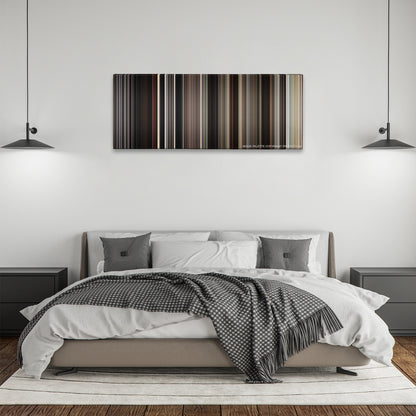 Looper color palette canvas above a bed, between two black pendant lamps