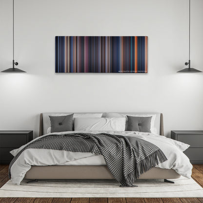 The Terminator color palette canvas above a bed, between two black pendant lamps