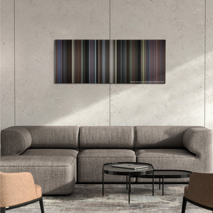 Southpaw color palette canvas on a concrete wall above a gray sectional sofa