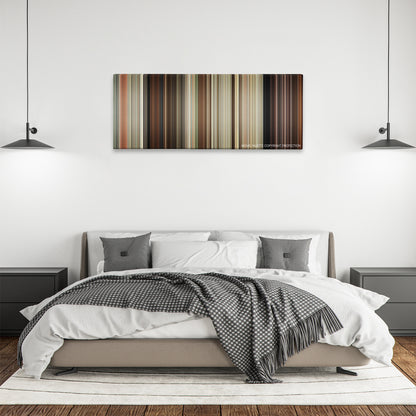 Drive Angry color palette canvas above a bed, between two black pendant lamps