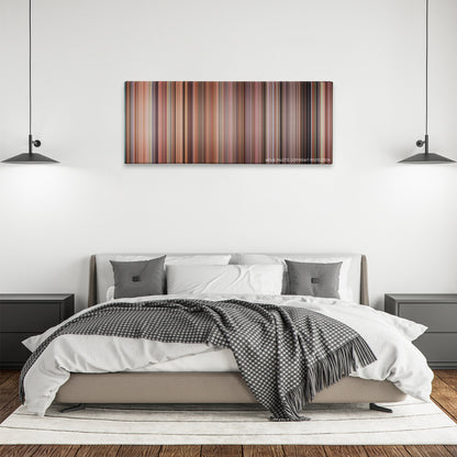 Cheaper by the Dozen color palette canvas above a bed, between two black pendant lamps