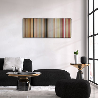 Little Miss Sunshine color palette canvas above a black sofa with a gold-topped table