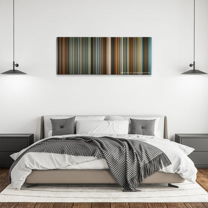 Philomena color palette canvas above a bed, between two black pendant lamps