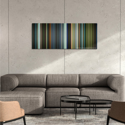 Focus color palette canvas on a concrete wall above a gray sectional sofa