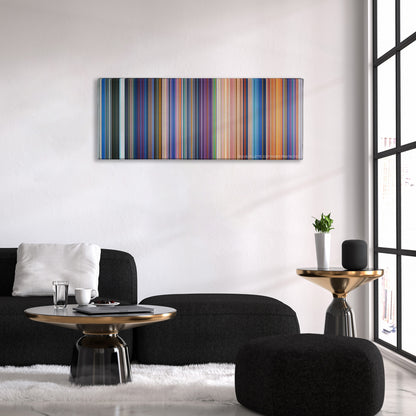 The Little Mermaid color palette canvas above a black sofa with a gold-topped table