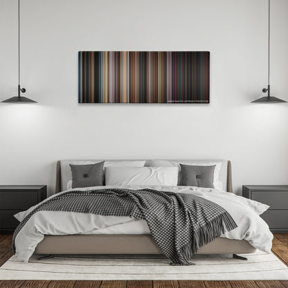 Spider-Man 3 color palette canvas above a bed, between two black pendant lamps