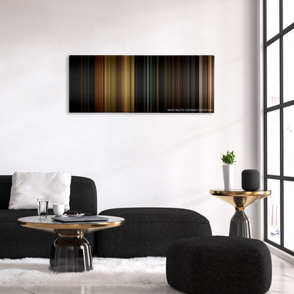 Vacancy color palette canvas above a black sofa with a gold-topped table