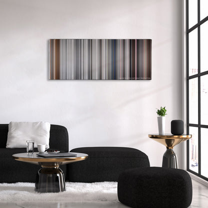 Pleasantville color palette canvas above a black sofa with a gold-topped table