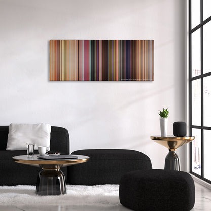 Toy Story color palette canvas above a black sofa with a gold-topped table
