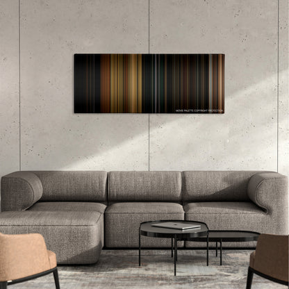 Vacancy color palette canvas on a concrete wall above a gray sectional sofa