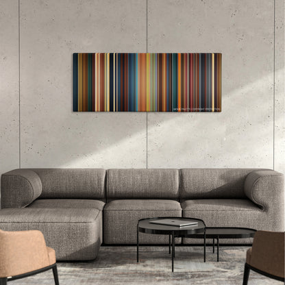 Alice Through the Looking Glass color palette canvas on a concrete wall above a gray sectional sofa