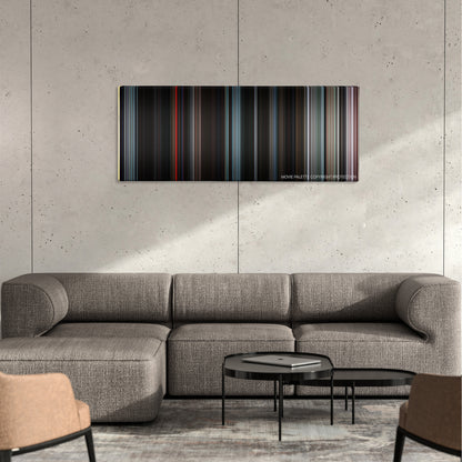 The Warriors color palette canvas on a concrete wall above a gray sectional sofa