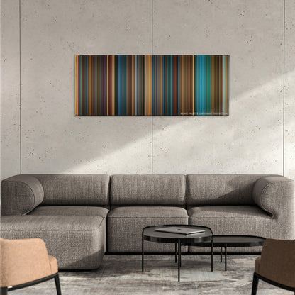 Kiss Kiss Bang Bang color palette canvas on a concrete wall above a gray sectional sofa
