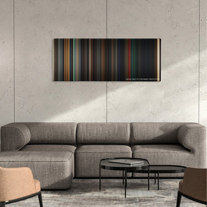 Insidious: Chapter 3 color palette canvas on a concrete wall above a gray sectional sofa