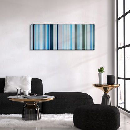 Happy Feet color palette canvas above a black sofa with a gold-topped table