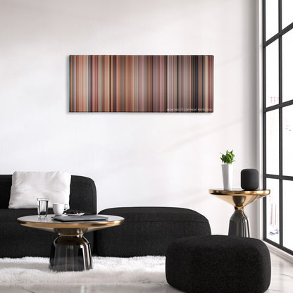 Cheaper by the Dozen color palette canvas above a black sofa with a gold-topped table