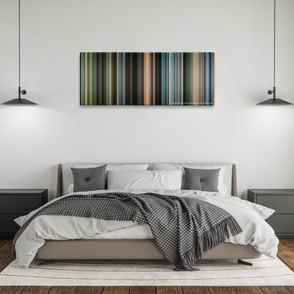 The Butterfly Effect color palette canvas above a bed, between two black pendant lamps