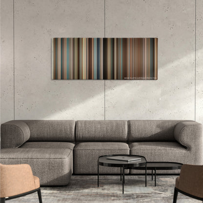 The Lincoln Lawyer color palette canvas on a concrete wall above a gray sectional sofa