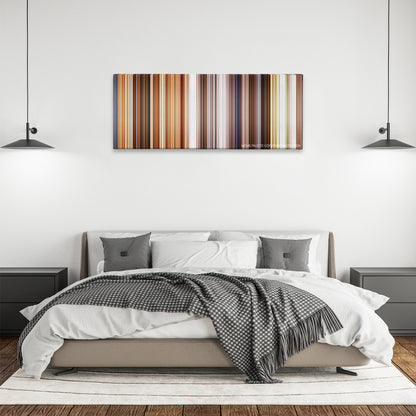 Jobs color palette canvas above a bed, between two black pendant lamps