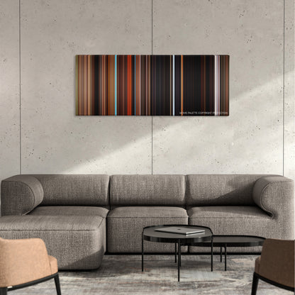 Zathura: A Space Adventure color palette canvas on a concrete wall above a gray sectional sofa