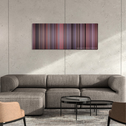 Jingle All the Way color palette canvas on a concrete wall above a gray sectional sofa