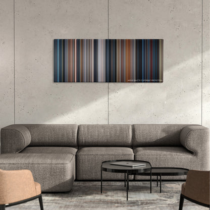 Conspiracy Theory color palette canvas on a concrete wall above a gray sectional sofa