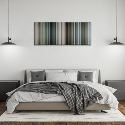 Elysium color palette canvas above a bed, between two black pendant lamps
