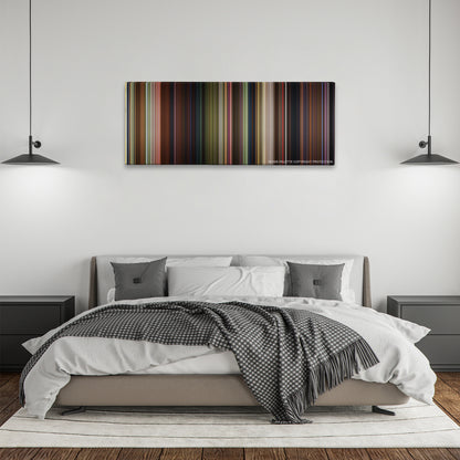 Shrek 2 color palette canvas above a bed, between two black pendant lamps