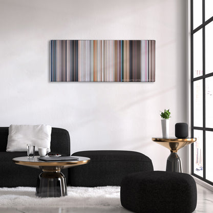 Superman II color palette canvas above a black sofa with a gold-topped table