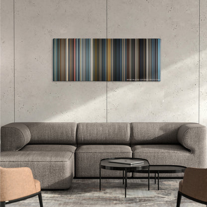 Munich color palette canvas on a concrete wall above a gray sectional sofa