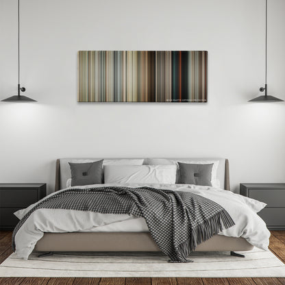 The Hurt Locker color palette canvas above a bed, between two black pendant lamps